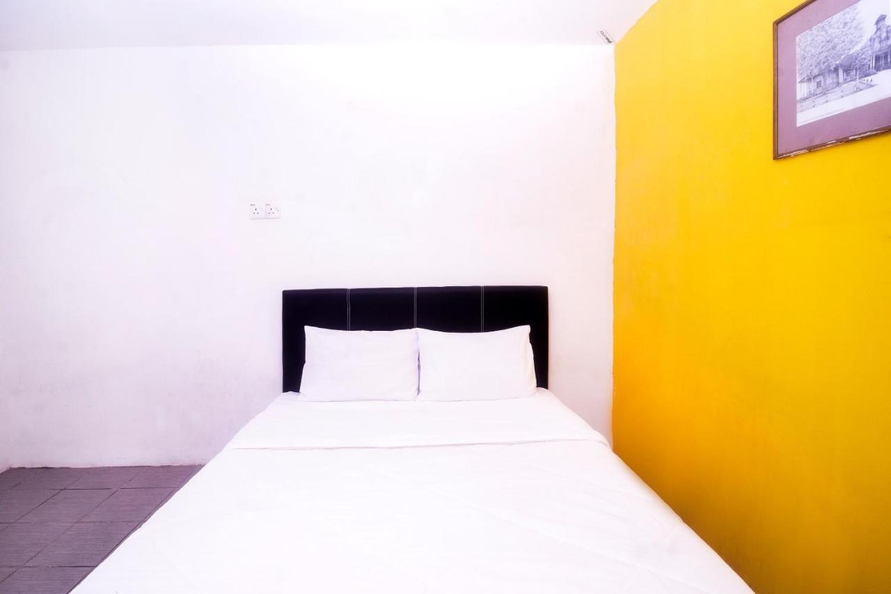 Spot On 89886 Backpacker'S Stay Services Kuching Exterior foto